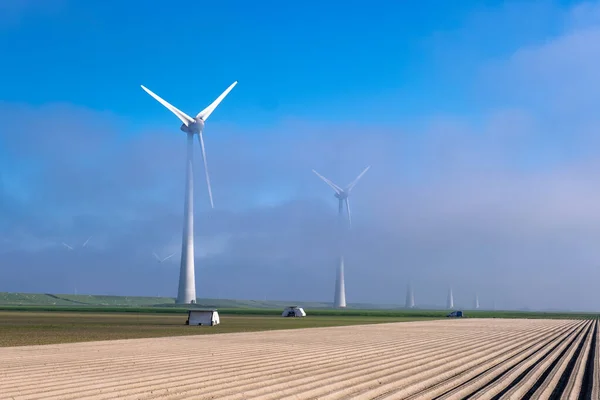 Offshore windmill park with clouds and a blue sky, windmill park in the ocean drone aerial view with wind turbine Flevoland Pays-Bas Ijsselmeer — Photo