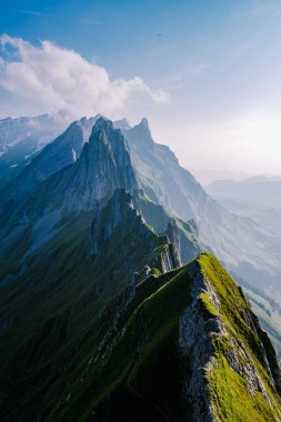 Schaefler Altenalptuerme mountain ridge swiss Alpstein alpine Appenzell Innerrhoden Switzerland,steep ridge of the majestic Schaefler peak in the Alpstein mountain range Appenzell, Switzerland with clipart