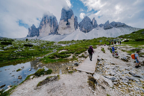 Tre Cime di Lavaredo peaks or Drei Zinnen at sunset, Dobbiaco -Toblach, Trentino Alto Adige or South Tyrol, Italy