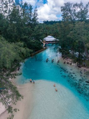 Tayland Körfezi 'nde yuva yapmış olan Koh Kood Adası büyüleyici turkuaz sular ve el değmemiş plajlar sunuyor..