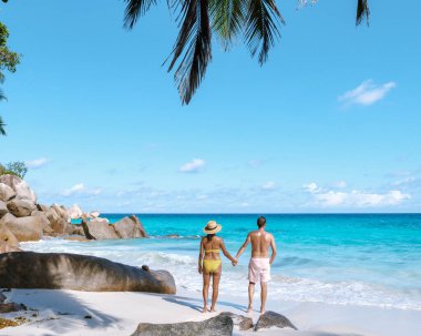 Berrak turkuaz sular, bir çift Anse Georgette plajı boyunca el ele yürürken usulca sahili öpüyor. Sıcak rüzgarda sallanan palmiyeler mükemmel bir tropikal kaçış yaratır. Praslin, Seyşeller