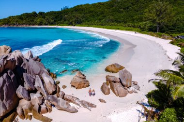 Discover the beauty of Anse Cocos beach on La Digue, Seychelles. Soft white sand, turquoise waters, and unique rock formations create a perfect tropical paradise for relaxation and exploration.