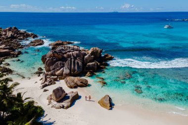 Experience the breathtaking beauty of Anse Cocos beach on La Digue Island in Seychelles. With its turquoise waters and unique rock formations, it's ideal for relaxation and adventure.