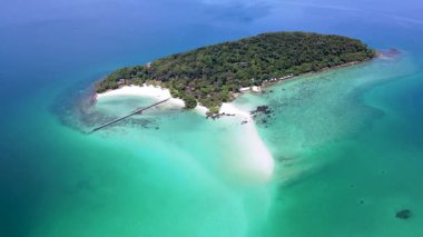 Trat, Tayland 'daki Koh Kham' ın nefes kesici manzarasını keşfedin, el değmemiş plajlar, yemyeşil alanlar ve turkuaz sular. Tatil maceraları ve cennette rahatlama için mükemmel..