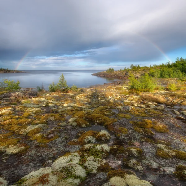 Rainbow in Ladoga skerries — Stockfoto