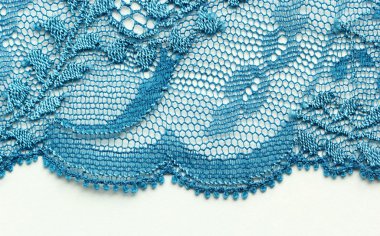 Mavi çiçekler ve dantel malzeme makro çekim yaprakları