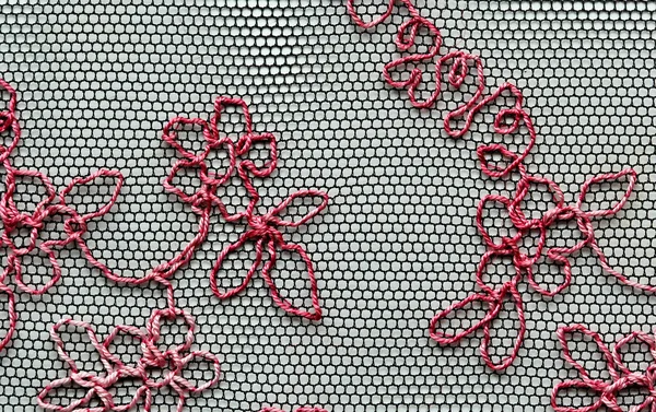Rote Blüten und Blätter Spitzenmaterial Textur Makroaufnahme — Stockfoto
