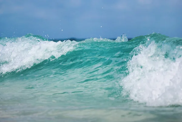 The close up shot of ocean wave with foam Royalty Free Stock Photos