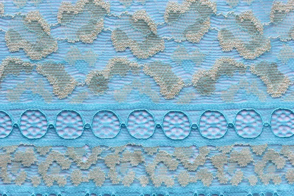 Gambar makro dari bahan tekstur renda biru — Stok Foto