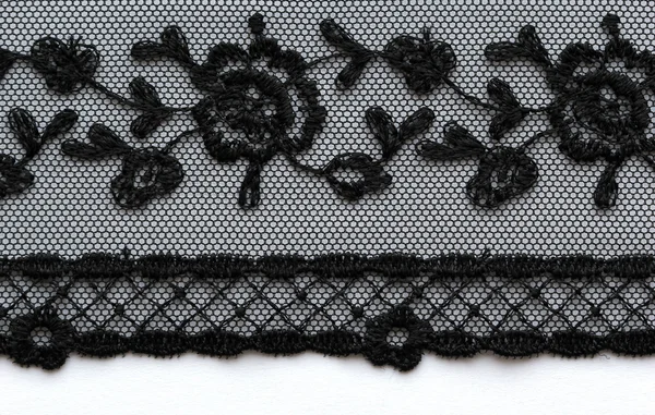 The macro shot of the white and black lace texture material — Stock Photo, Image