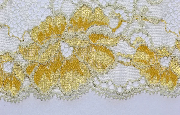 The macro shot of the yellow and ivory lace texture material — Stock Photo, Image