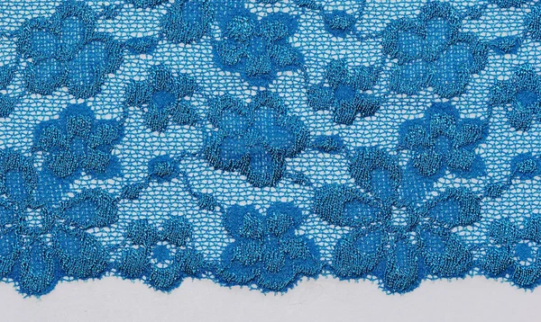 A kék virágok a makro lövés csipke textúra materia — Stock Fotó