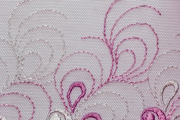 Makroaufnahme des Texturmaterials aus rosa und magenta Spitze — Stockfoto