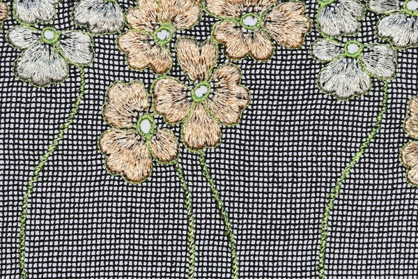 El macroplano del material de textura de encaje de flores blancas y beige Fotos de stock libres de derechos