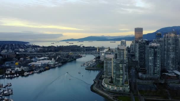 Aerial view of two bridges and Vancouver downtown on a sunny morning