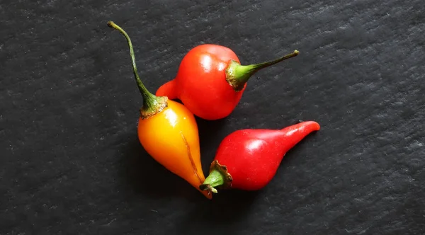 Fotografie Van Drie Rode Gele Pimentos Biquinhos Voor Voedselachtergrond — Stockfoto