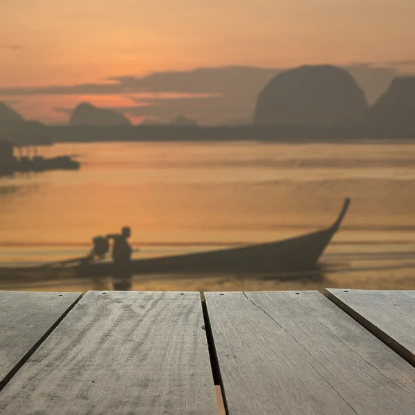 Defocused and blur image of terrace wood and beautiful seascape and fisherman in morning view for background usage — Stock Photo, Image