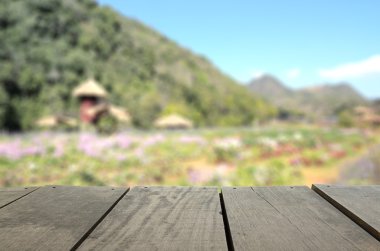 Defocused ve tarım Teras ahşap ve arka plan kullanım için güzel çayır görüntü bulanıklığı