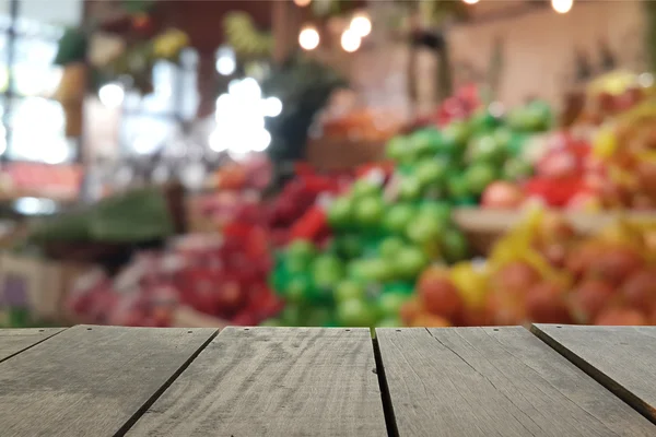 Defocus and blur image of terrace wood and Supermarket blur background in Fruits and Vegetables devision for background usage — Stock Photo, Image