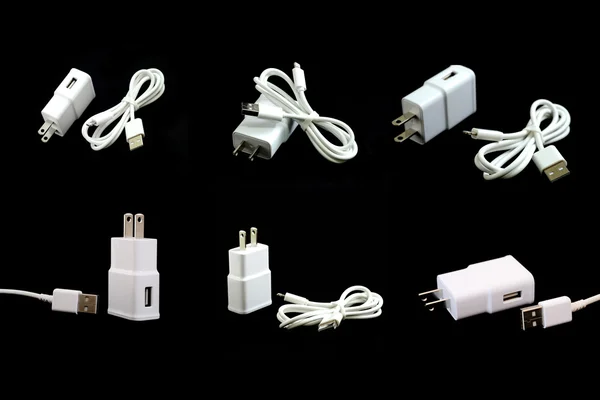 Collection of white electric USB cable isolated on black — Stockfoto