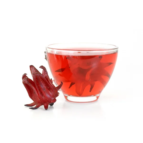 Hibiskus sabdariffa sok lub roselle sok w trawie na białym tle — Zdjęcie stockowe