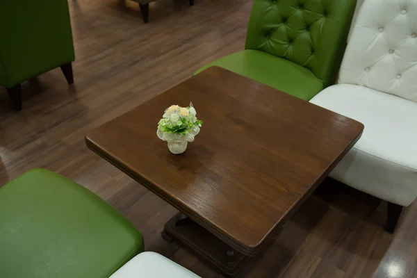 Sofa and vintage table in living room — Stock Photo, Image