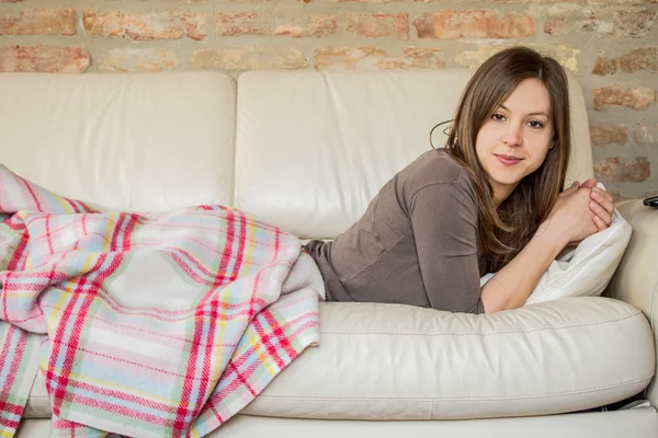 Mujer seria acostada en la cama después de despertar —  Fotos de Stock