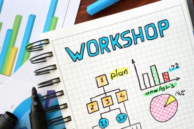 Bir defterde yazılı atölye.