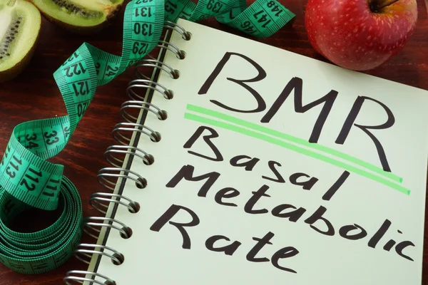 BMR Basal metabolic rate written on a notepad sheet. — Stock Photo, Image