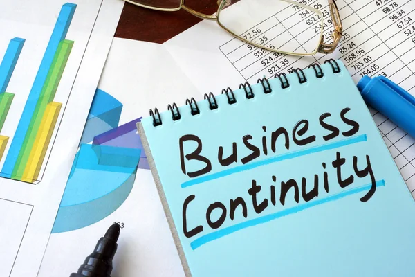 Business Continuity written on a notepad with marker.