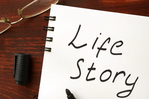 Life story sign written in a notepad. — Stock Photo, Image