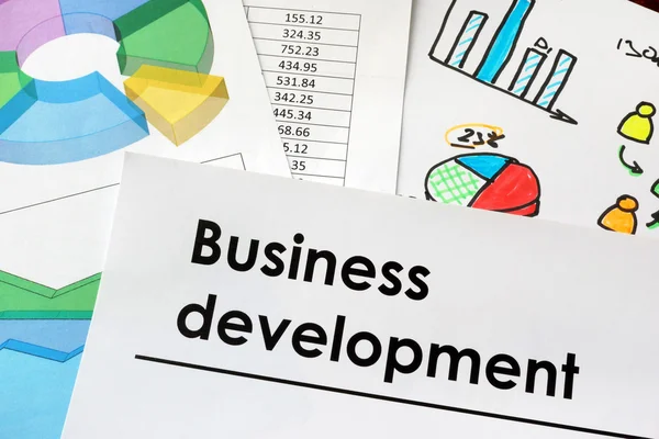 Business development tecken på ett papper. — Stockfoto