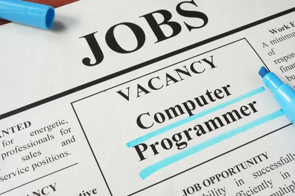 Newspaper with ads for vacancy Computer Programmer. — Stock Photo, Image