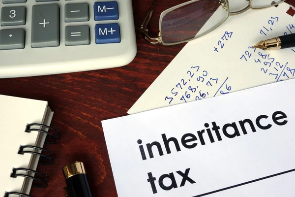 Inheritance tax written on a paper. — Stock Photo, Image