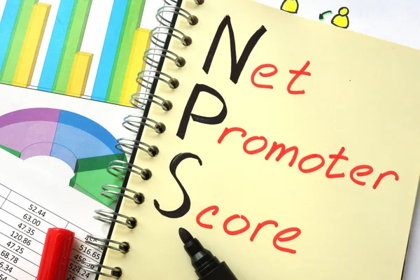 Notizbuch mit sign nps net promoter score — Stockfoto