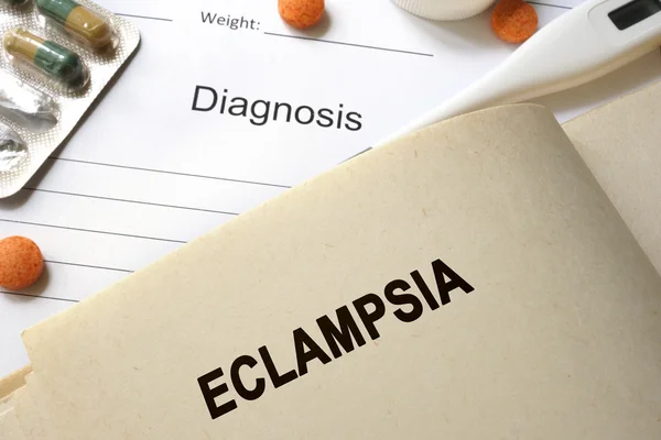 Página com palavra eclampsia e óculos. Conceito médico . — Fotografia de Stock