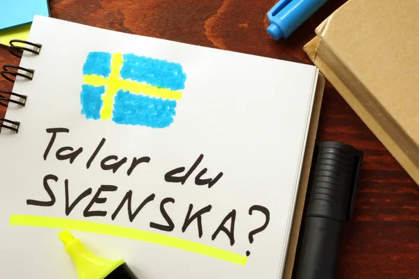 Вивчайте шведську мову, написану в блокноті. Концепція освіти . — стокове фото