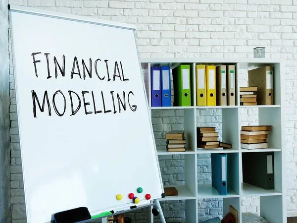 Financial modelling words on the whiteboard in the room. — Stock Photo, Image