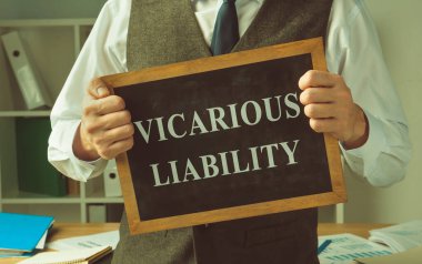 Vicarious liability sign in the hands of a financial advisor. clipart