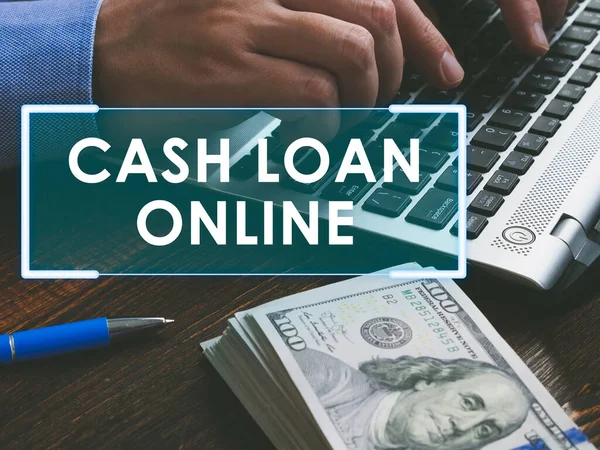 Cash loan online concept. Money and hands with keyboard.