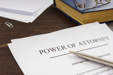 Power of attorney POA legal document and pen. clipart