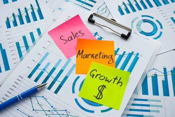 Words Sales marketing and profit growth as plan on the charts. — Stock Photo, Image