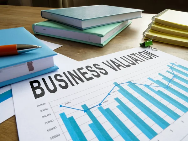 Papers with business valuation in the charts. — Stock Photo, Image