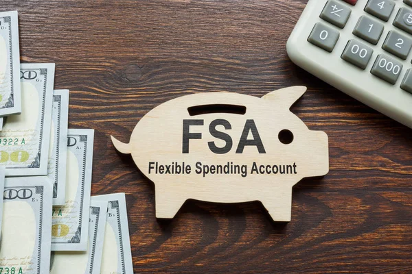 FSA flexible spending account words on the wooden piggy bank. — Stock Photo, Image