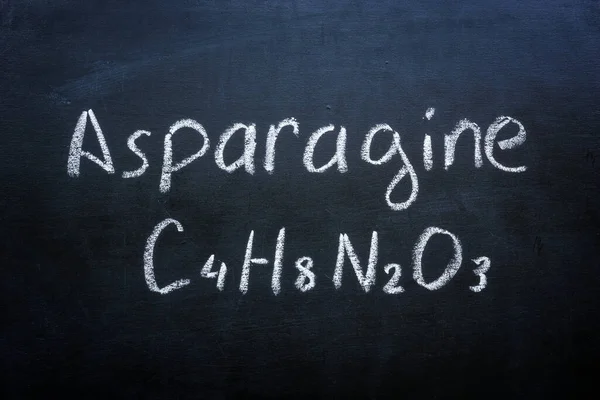 Ácido y fórmula química de la asparagina escritos en la pizarra. — Foto de Stock