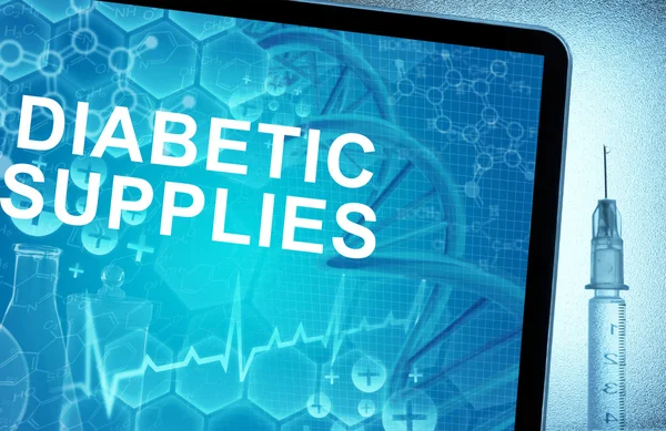 Ordene Diabetic Supplies på en tablett med sprøyte – stockfoto
