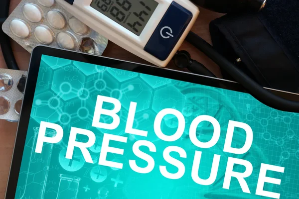 Tablet with the words Blood pressure — Stock Photo, Image