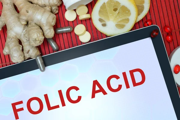 Tablet with words  Folic acid — Stock Photo, Image