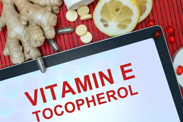 Tablett med ord tokoferol (vitamin E) — Stockfoto