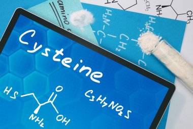 Sistein kimyasal formülü ile tablet.